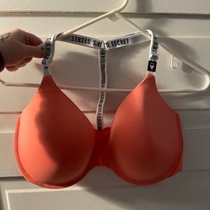 Victoria secret front closure bra. NWT 38 Ddd. Orange/white. Lightly lined.